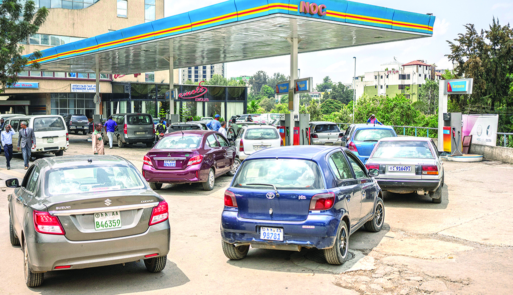 ADDIS ABABA: Cars wait in queue at a fuel station in Addis Ababa, Ethiopia, on July 6, 2022. - AFP