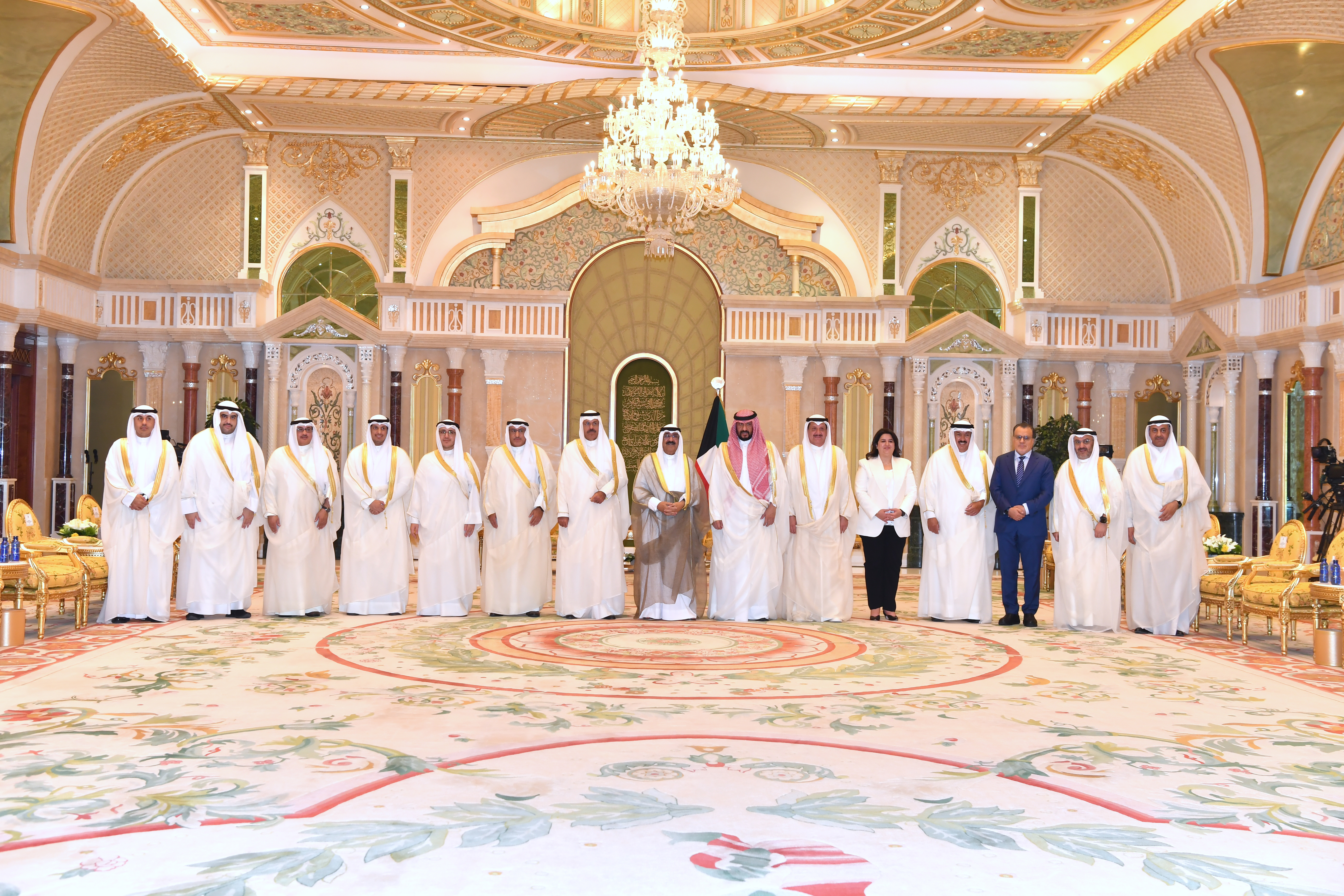 KUWAIT: His Highness the Crown Prince Sheikh Mishal Al-Ahmad Al-Jaber Al-Sabah receives the new Cabinet's members. -- Amiri Diwan photo