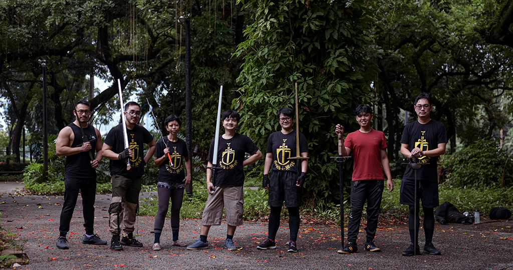 This picture shows members of the Gwaith-i-Megyr group posing for a photograph before practicing sword-fighting techniques known as Historical European Martial Arts (HEMA) at a park in Jakarta. - AFP photos
