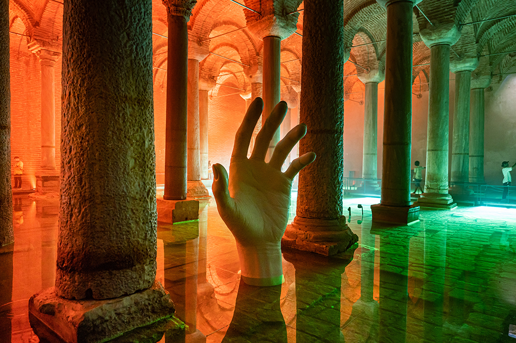 People visiting the Basilica Cistern historic site in Istanbul, Turkey.