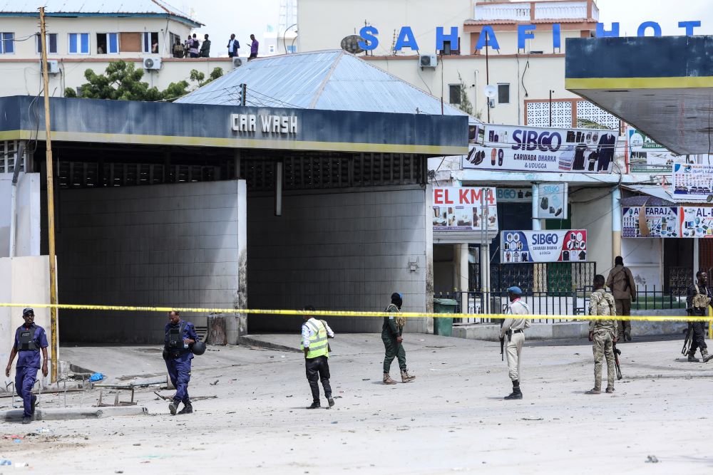 Mogadishu: Security officers patrol at the the site of explosions in Mogadishu on August 20, 2022.  -- AFP