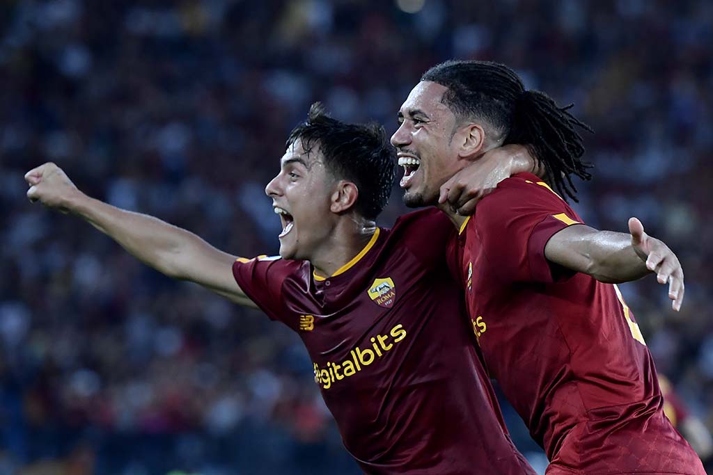 ROME: AS Roma's British defender Chris Smalling (R) celebrates with Argentinian forward Paulo Dybala after scoring a goal during the Italian Serie A football match between AS Roma and Cremonese at the Olympic Stadium in Rome. – AFP