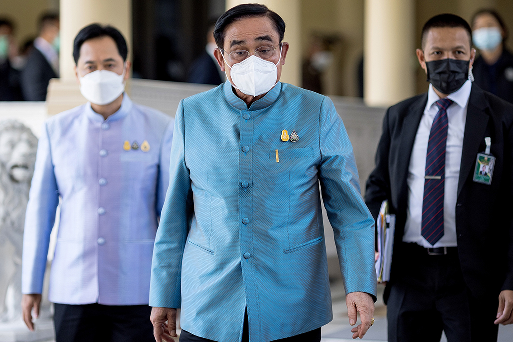 BANGKOK, Thailand: Thailand's Prime Minister Prayut Chan-O-Cha (C) leaves after his weekly cabinet meeting at the Government House in Bangkok on August 23, 2022. - AFP