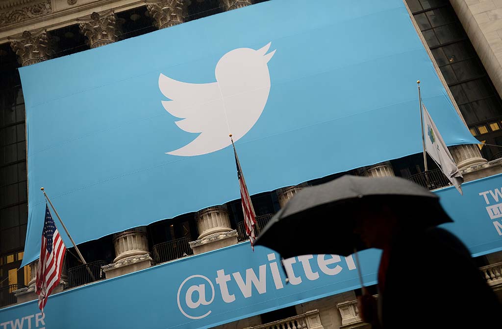 NEW YORK: In this file photo, a banner with the logo of Twitter is set on the front of the New York Stock Exchange in New York. Twitter faced scrutiny from US market regulators over how the platform calculates the number of false or spam accounts, a topic at the heart of the firm's legal battle with Elon Musk. – AFP