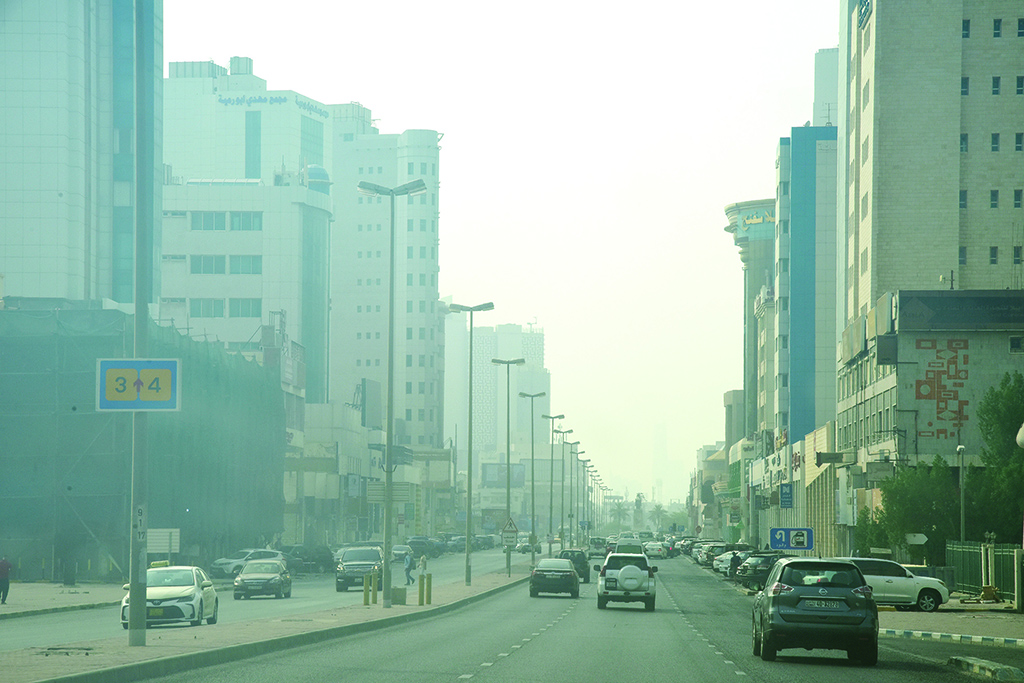 KUWAIT: A picture showing haze in Hawally yesterday. Kuwait Meteorological Center said that humidity would drop Tuesday, while chances of strong winds and rising dust would increase. – Photo by Fuad Al-Shaikh