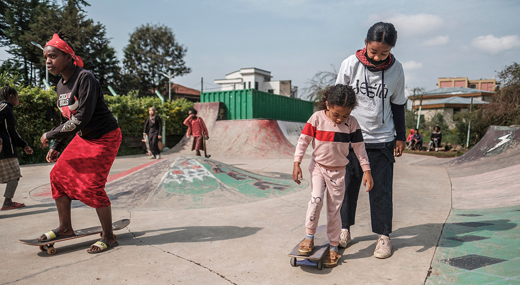 A trainer teaches a young girl how to skate in a skate park as part of a weekly training of the group Ethiopian Girls Skate, in Addis Ababa, Ethiopia. The Ethiopian Girls Skate is an initiative that promotes skateboarding among girls of different social background in order to improve their mental health and empower them. – AFP photos