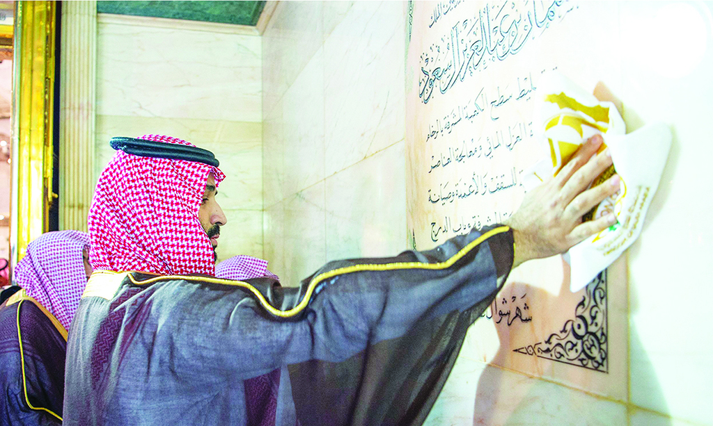 MAKKAH: Handout picture provided on Aug 16, 2022 shows Saudi Crown Prince Mohammed bin Salman leading the annual washing ceremony of the Holy Kabaa in the Grand Mosque. - AFP