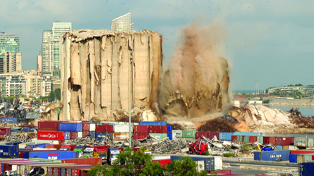 BEIRUT: This grab from footage shot on Aug 23, 2022 shows the collapse of the northern section of grain silos at the port of Beirut. - AFP