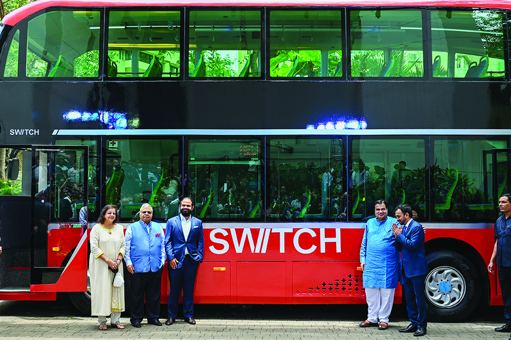 MUMBAI: India's Transport Minister Nitin Gadkari, Hinduja Group Chairman Ashok Hinduja, Ashok Leyland Director Shom Hinduja and Switch Group India's CEO Mahesh Babu pose for pictures during the launch event of the first electric double-decker public transport bus on Aug 18, 2022. - AFP