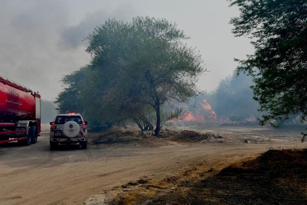 KUWAIT: Firemen battle a blaze at a farm in Sulaibiya.