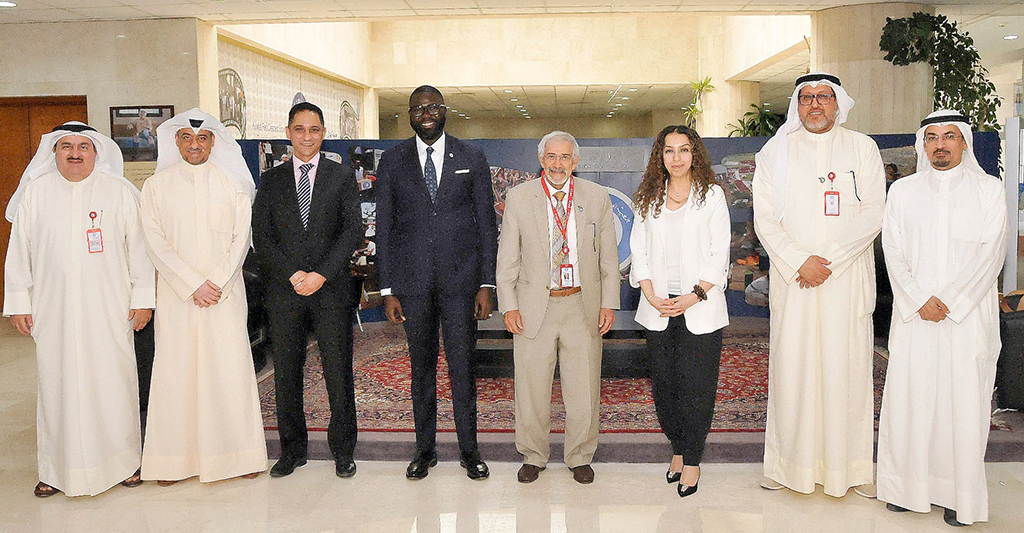 KUWAIT: The head of the regional International Committee of the Red Cross Mamadou Sow in a group photo during his visit to the Kuwait Crescent Society. - KUNA