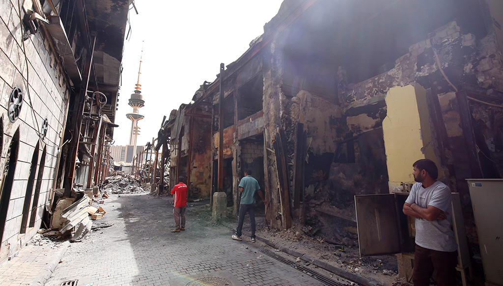 KUWAIT: An archive photo showing damage left by the fire at Souq Mubarakiya.