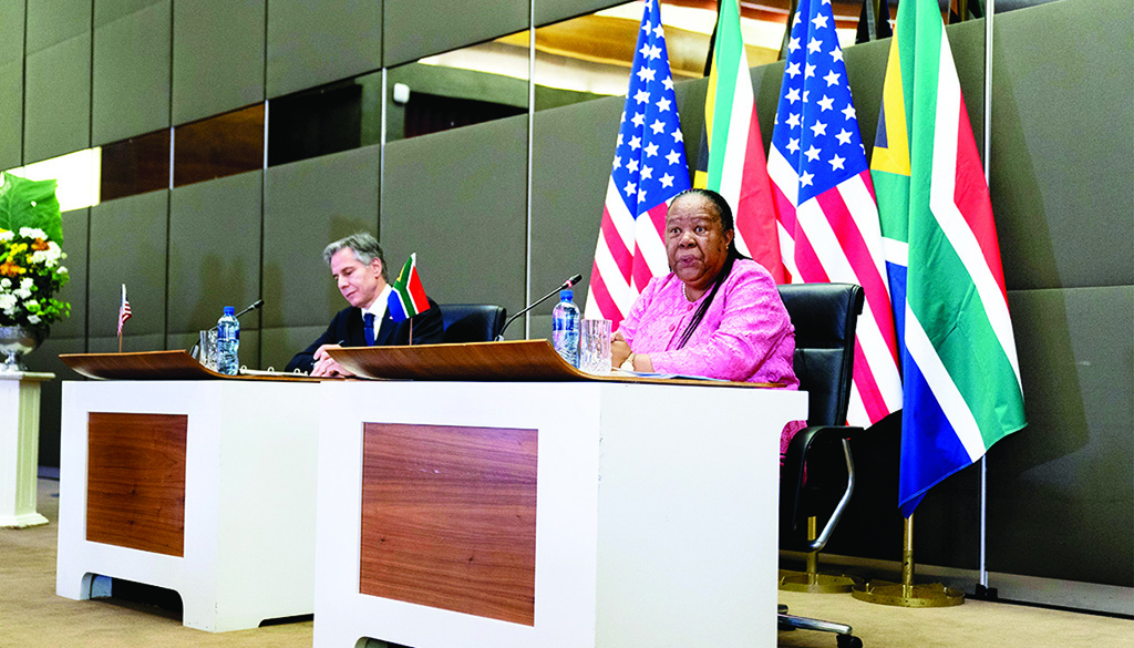 PRETORIA, South Africa: South Africa's Foreign Minister Naledi Pandor (R), accompanied by US Secretary of State Antony Blinken (L), speaks to members of the media after meeting together at the South African Department of International Relations and Cooperation in Pretoria. - AFP