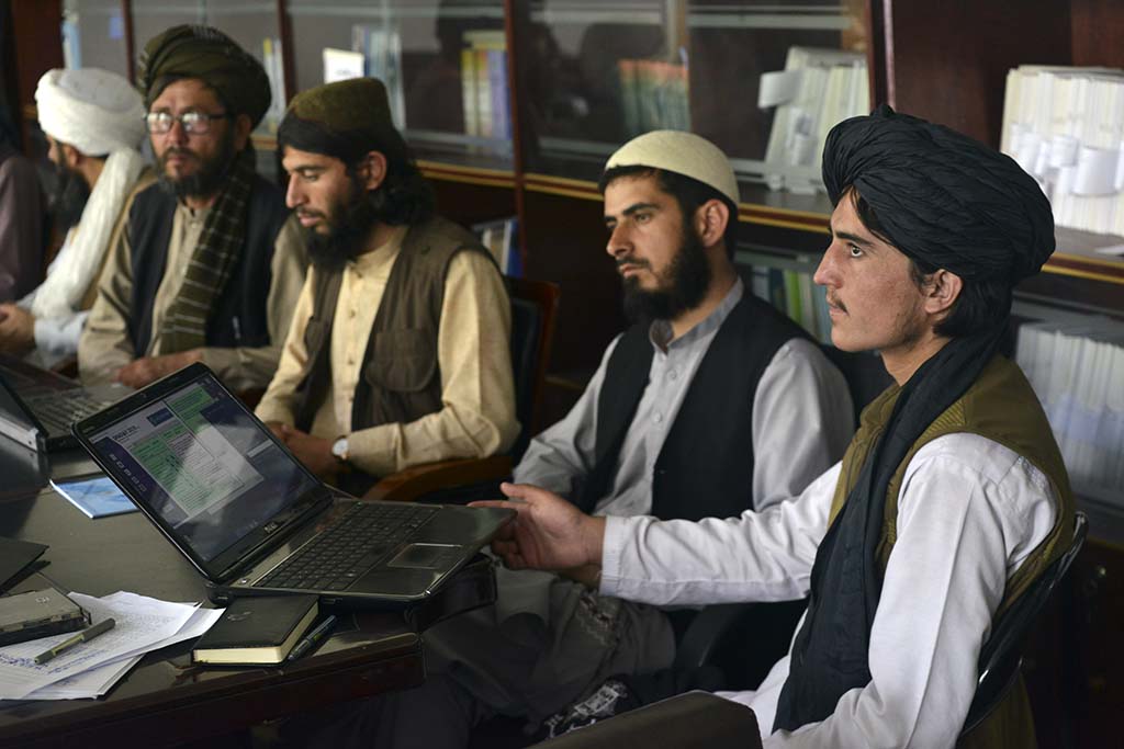 KABUL: In this photo taken on June 5, 2022, members of the Taleban attend a computer science class at the Ministry of Transport and Civil Aviation in Kabul. – AFP