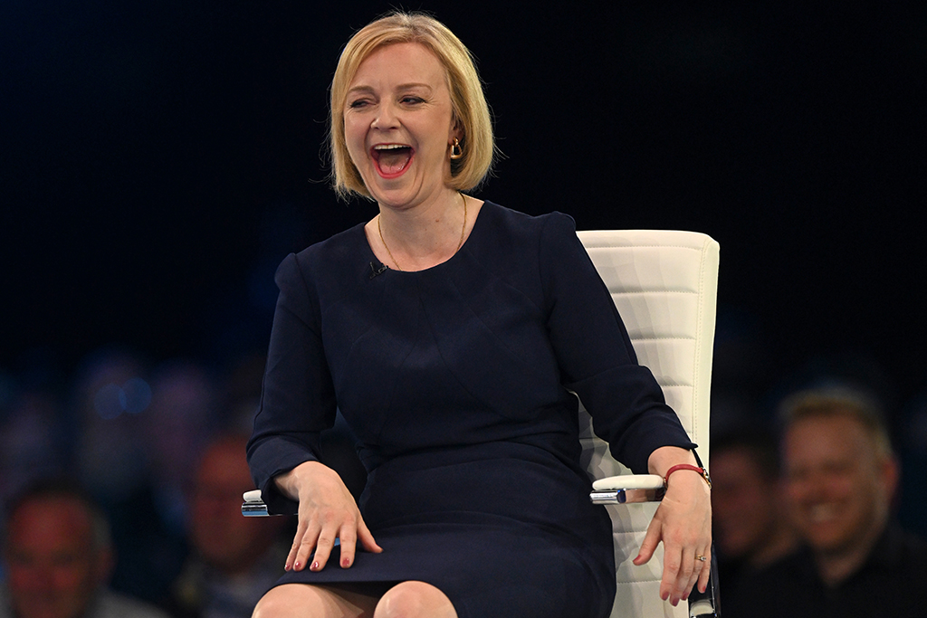 MANCHESTER, United Kingdom: Contender to become the country's next Prime minister and leader of the Conservative party British Foreign Secretary Liz Truss smiles during a Conservative Party Hustings event in Manchester, north-west England, on August 19, 2022. - AFP