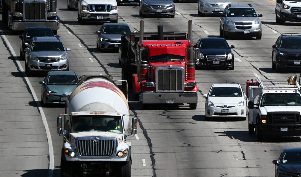 LOS ANGELES: Cars, trucks, SUVs, and other vehicles drive in traffic on the 405 freeway through the Sepulveda Pass in Los Angeles, California.— AFP