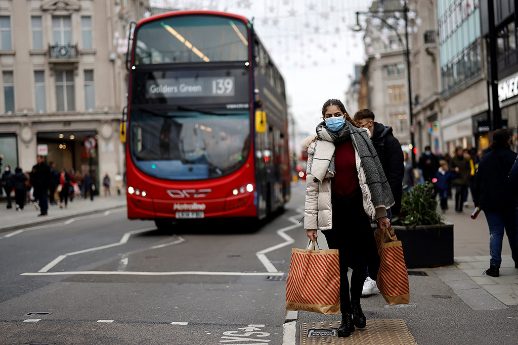 LONDON: Shoppers walking along Oxford Street in London. – AFP