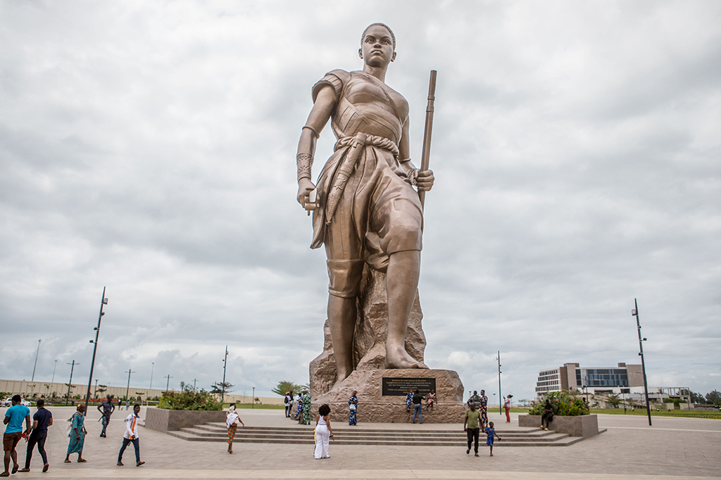 A giant 30-metre high bronze statue representing an Amazon is seen in central Cotonou as a symbol of national identity and key part of its rich history to showcase in a bid to attract tourists to the country.— AFP photos