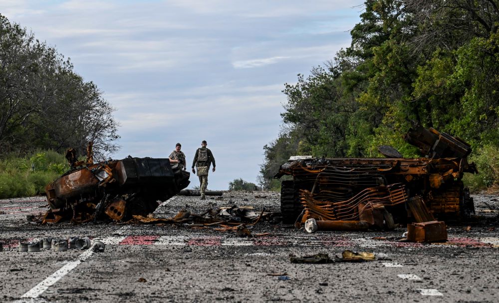 BALAKLIYA: Destroyed armored vehicles litter the road in Balakliya, Kharkiv region, on September 10, 2022, amid the Russian invasion of Ukraine. - AFP