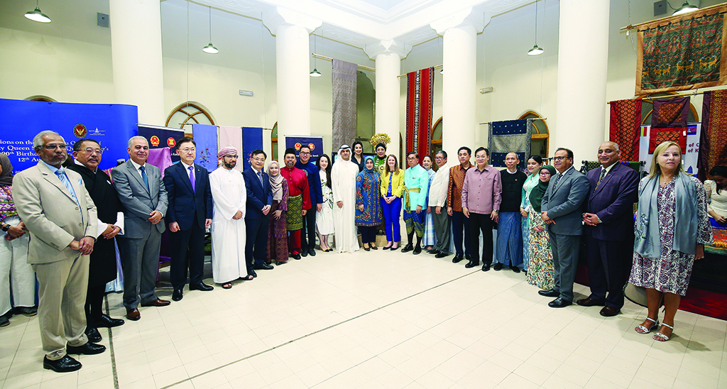 KUWAIT: Sadu House officials and ASEAN ambassadors pose for a group photo during the ASEAN textile exhibition at Sadu House. – Photos by Yasser Al-Zayyat