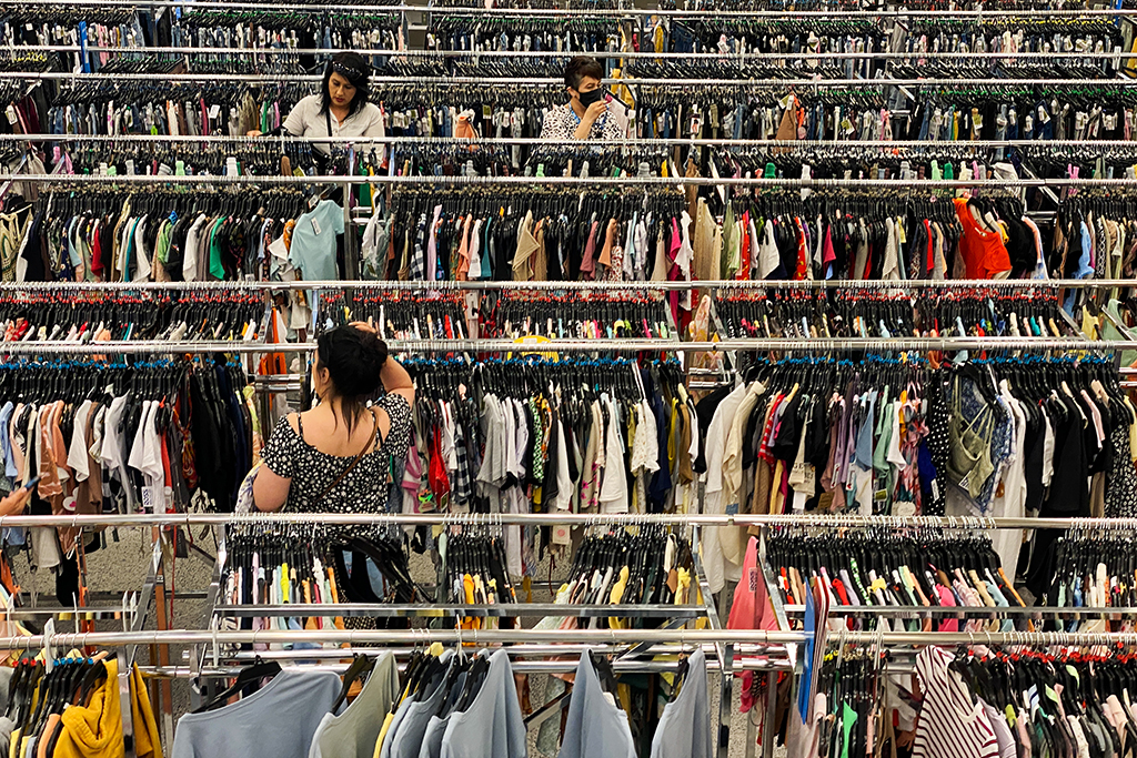 LAS VEGAS: In this file photo taken on May 07, 2022, customers browse racks of clothing as they shop inside a discount department retail store in Las Vegas, Nevada. -- AFP