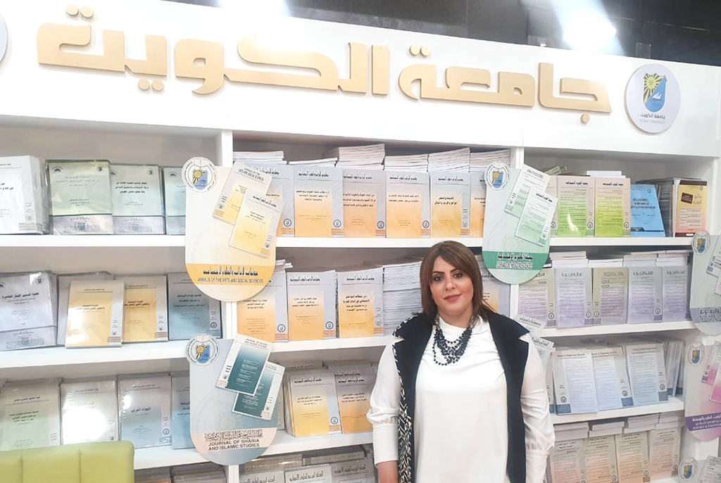 AMMAN: KU representative Rawya Al Mutar at the Kuwait pavilion at Amman Book Fair. —  KUNA
