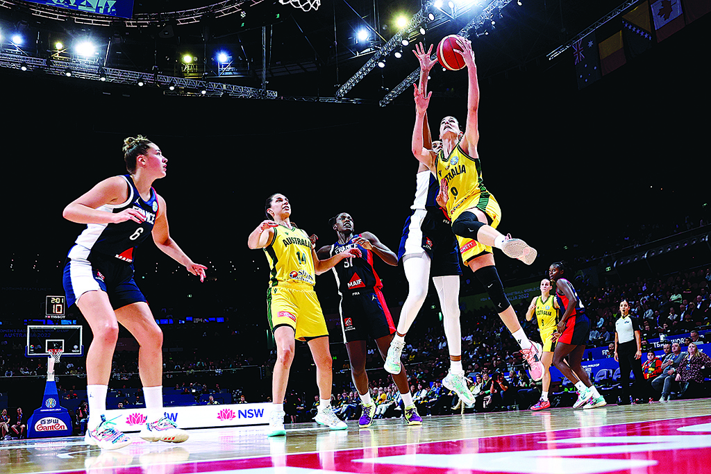 SYDNEY, Australia: Australia's Bec Allen shoots during the Women's Basketball World Cup group B game between Australia and France in Sydney on September 22, 2022.- AFP