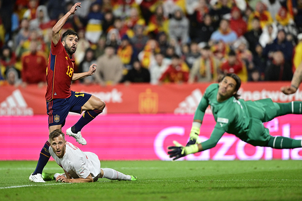 ZARAGOZA: Spain's midfielder Jordi Alba (left) scores his team first goal during the UEFA Nations League, league A, group 2 football match between Spain and Switzerland on September 24, 2022. - AFP