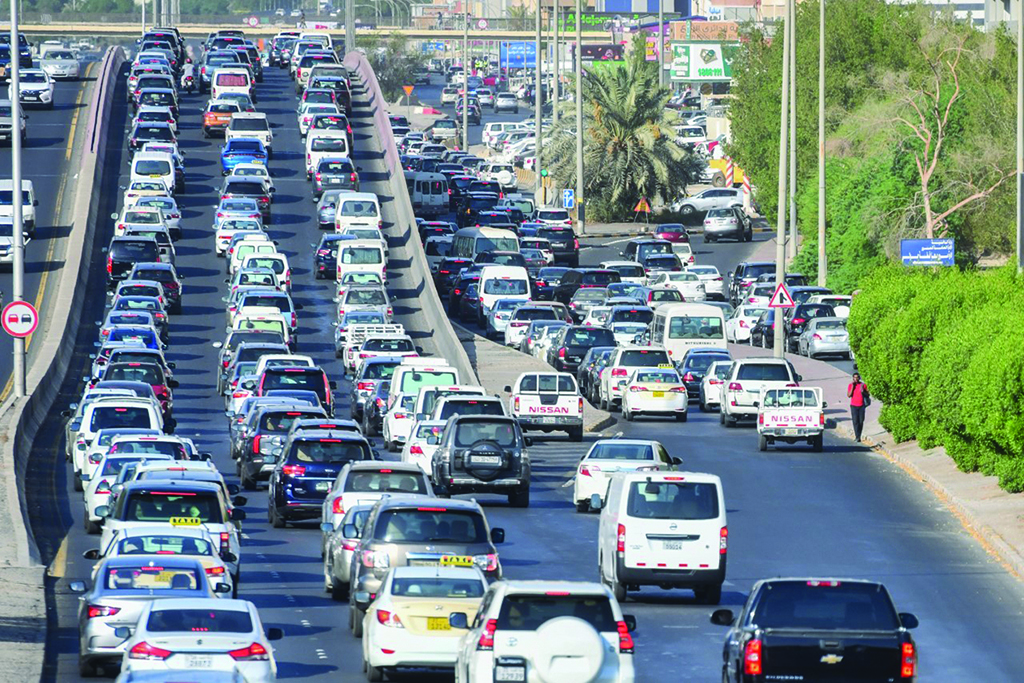 KUWAIT: Traffic jams returned to Kuwait's streets as public schools and universities reopened. – Photo by Yasser Al-Zayyat