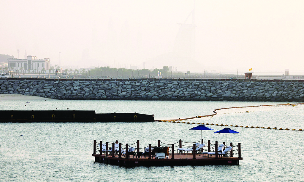 DUBAI: Sunbeds are lined up on a floating platform at a beach on Sept 15, 2022. - AFP