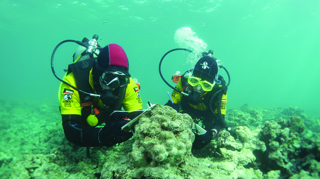 KUWAIT: Members of the dive team monitor the health of the coral reefs.