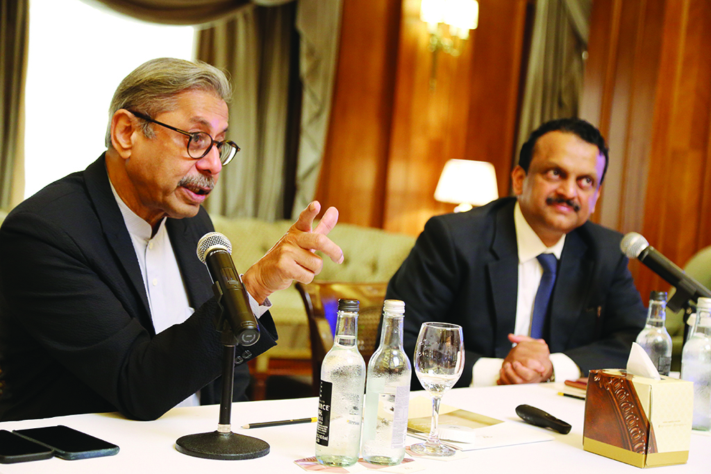 KUWAIT: Dr Naresh Trehan makes a point during the press conference as IDF President Amir Ahmad looks on. - Photo by Sajeev K Peter