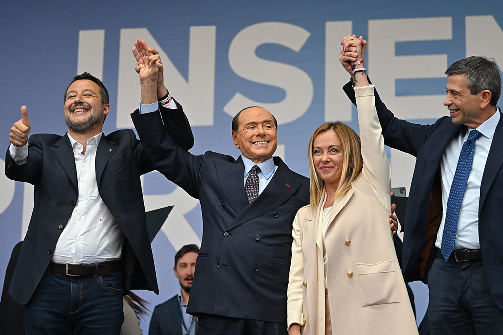 ROME: (From left) Leader of Italian far-right Lega (League) party Matteo Salvini, Forza Italia leader Silvio Berlusconi, leader of Italian far-right party 'Fratelli d'Italia' (Brothers of Italy) Giorgia Meloni, and Italian centre-right lawmaker Maurizio Lupi stand on stage after the general election victory. - AFP