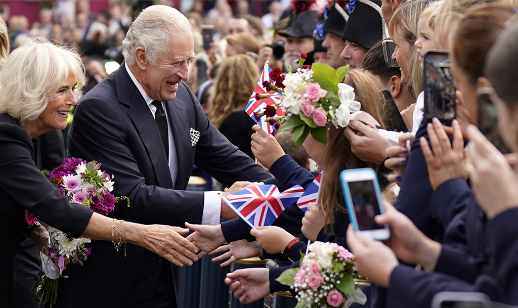 BELFAST, United Kingdom: Britain's King Charles III and Britain's Camilla, Queen Consort greet wellwishers as they arrive at Hillsborough Castle in Belfast on September 13, 2022, during his visit to Northern Ireland. – AFP