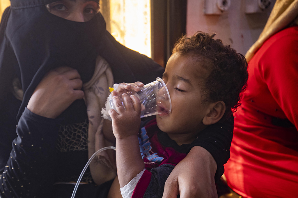 AL-KASRAH, Syria: A child suffering from cholera receives treatment at the Al-Kasrah hospital in Syria's eastern province of Deir Ezzor, on September 17, 2022, affected by the usage of contaminated water from the Euphrates River, a major source for both drinking and irrigation. – AFP