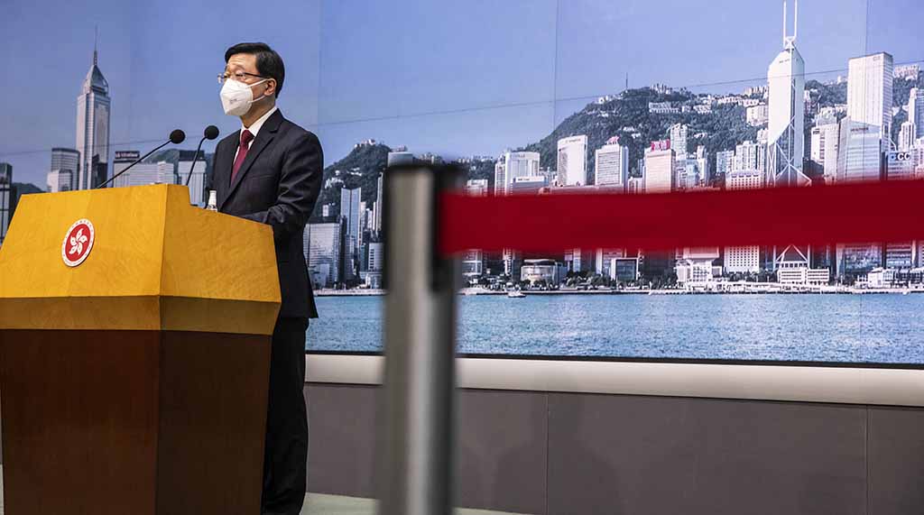 HONG KONG: Hong Kong Chief Executive John Lee speaks to the media before an Executive Council meeting in Hong Kong on September 6, 2022. - AFP