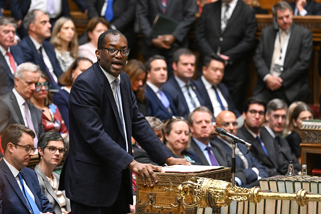 LONDON:A handout photograph released by the UK Parliament shows Britain's Chancellor of the Exchequer Kwasi Kwarteng unveiling an anti-inflation budget plan at the House of Commons in London.— AFP