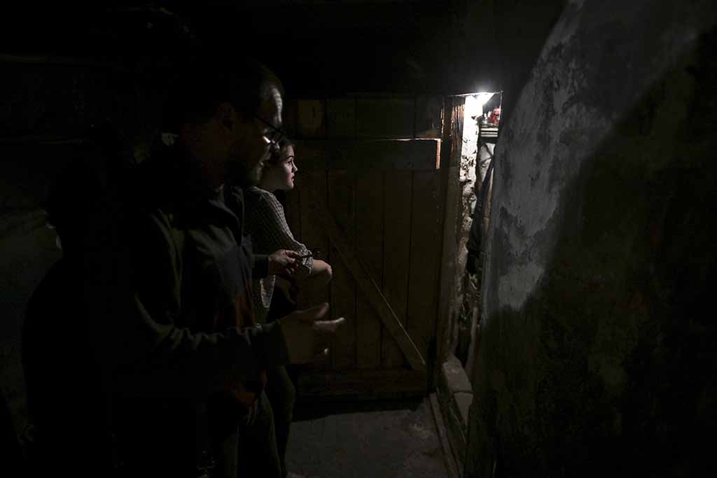 KRAMATORSK, Ukraine: A family gather inside a bunker in Kramatorsk, Donetsk region on September 6, 2022. According to local authorities, gas supplies in the Donetsk and Lugansk region has been suspended because of heavy shelling in the region – AFP