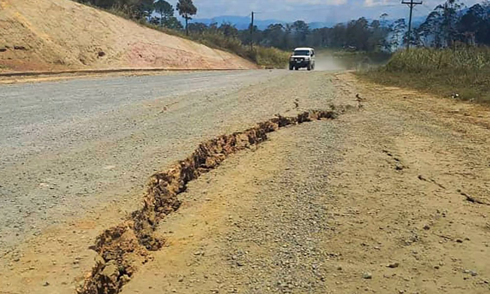 A large crack in a highway near the town of Kainantu, following a 7.6-magnitude earthquake in northeastern Papua New Guinea on Sunday, Sept. 11, 2022.