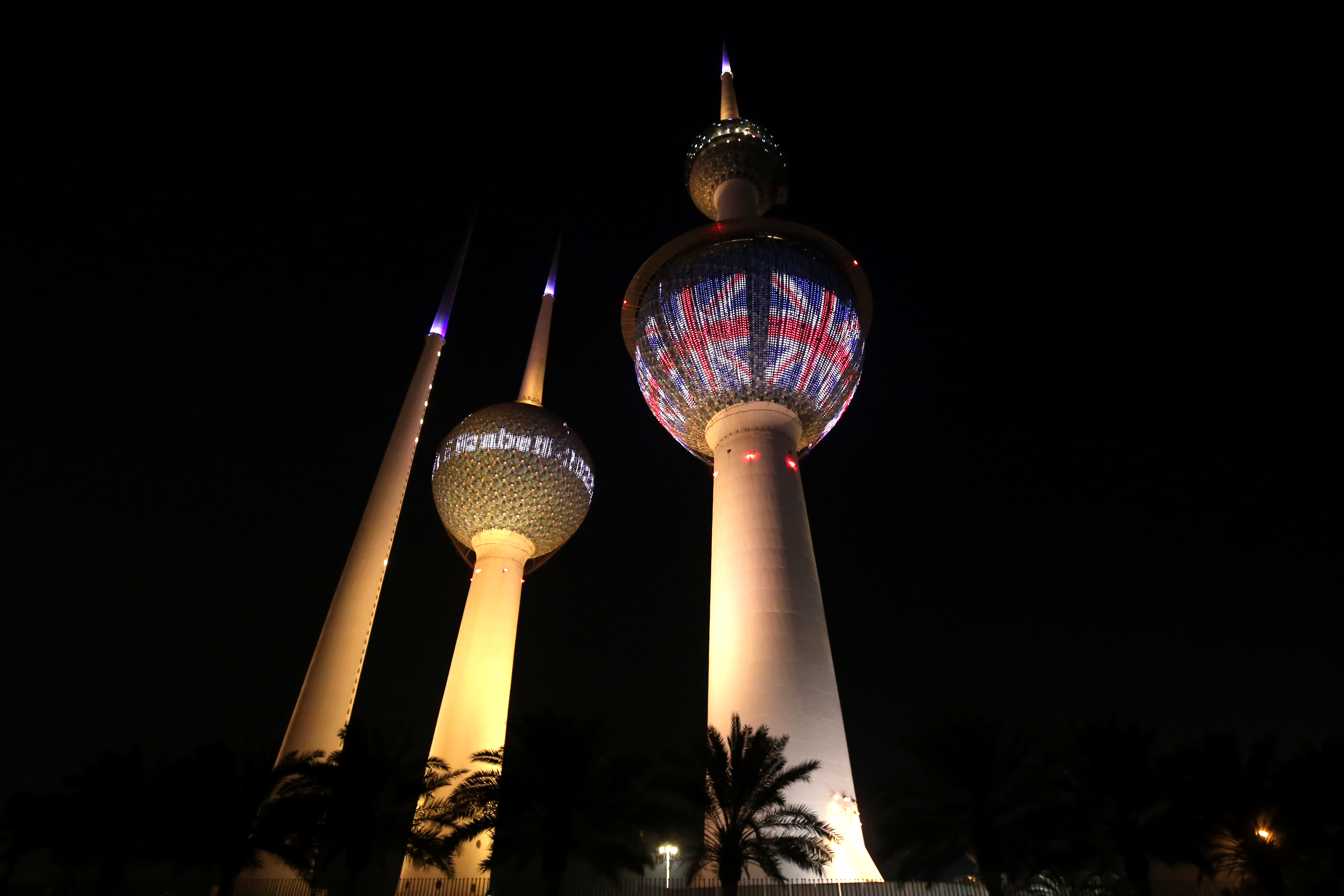 The Kuwait Towers are illuminated with the British flag in Kuwait City on September 9, 2022 following the passing of Queen Elizabeth II at the age of 96. (Photo by Yasser Al-Zayyat / AFP)