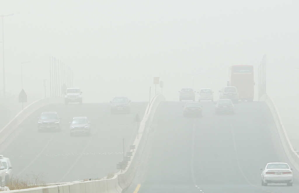 KUWAIT: Cars are seen during a heavy dust storm in this June 2022 file photo. -  Photo by Yasser Al-Zayyat