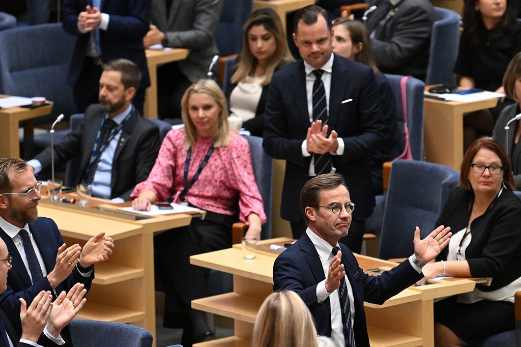 STOCKHOLM, Sweden: The leader of Sweden's Moderate Party and newly elected Prime Minister Ulf Kristersson (2nd R) and other Party members react after the voting at the parliament session to elect the new Swedish Prime Minister at the Swedish parliament Riksdagen in Stockholm, Sweden, on October 17, 2022. – AFP