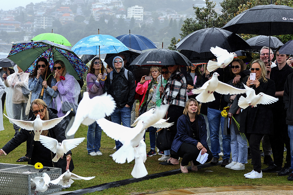 SYDNEY, Australia: Doves are released during a commemoration ceremony to mark the 20th anniversary of the Bali bombings, at Coogee Beach in Sydney on October 12, 2022. – AFP