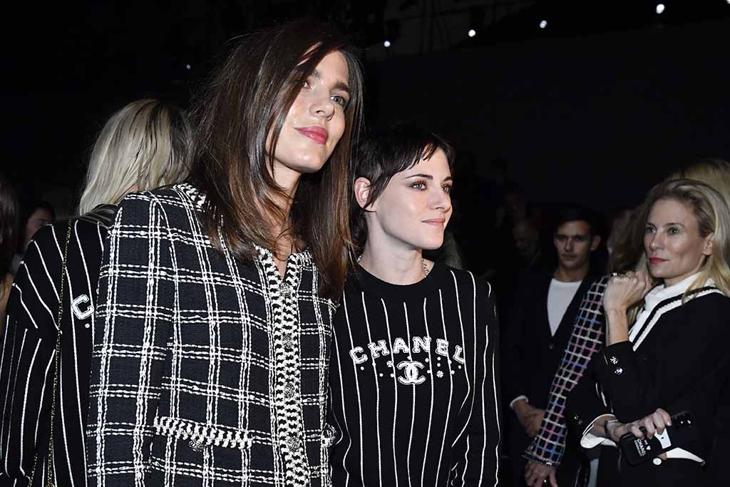 US actress Kristen Stewart (center) and Charlotte Casiraghi arrive arrives at the Chanel Spring-Summer 2023 fashion show as part of the Paris Womenswear Fashion Week, in Paris, on October 4, 2022. - AFP