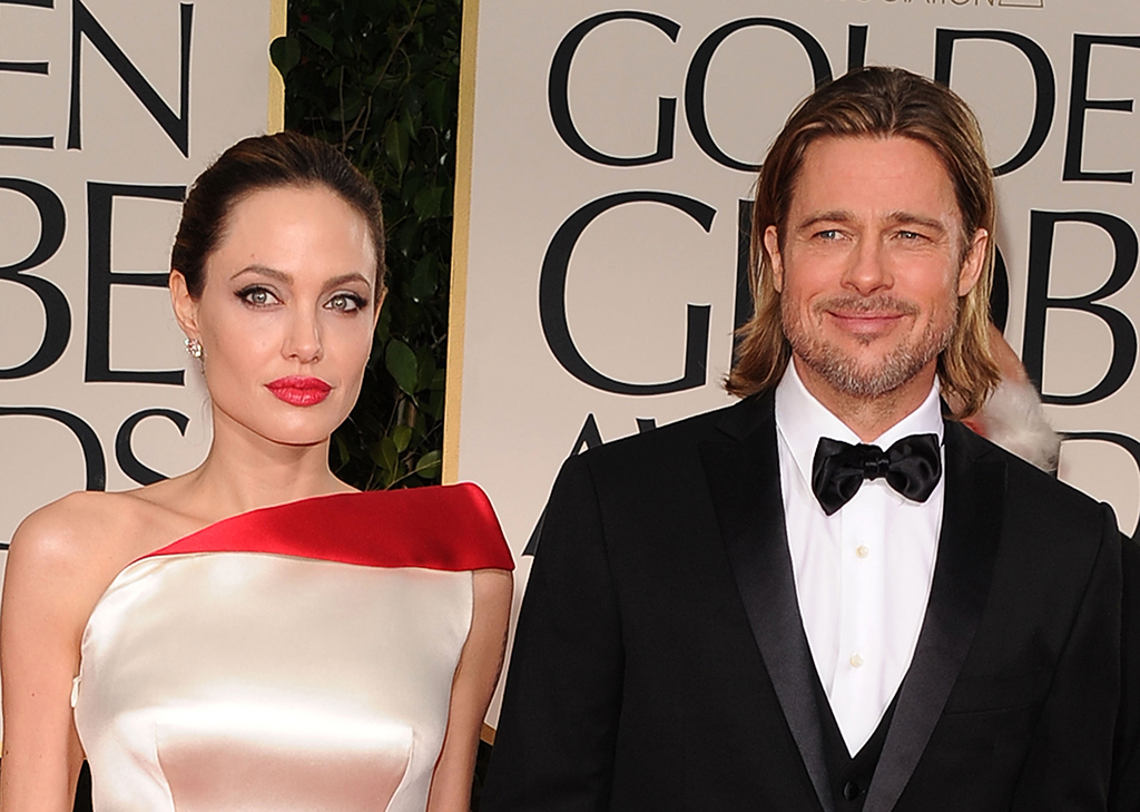 In this file photo, actors Angelina Jolie and Brad Pitt arrive at the 69th Annual Golden Globe Awards held at the Beverly Hilton Hotel in Beverly Hills, California. – AFP  
