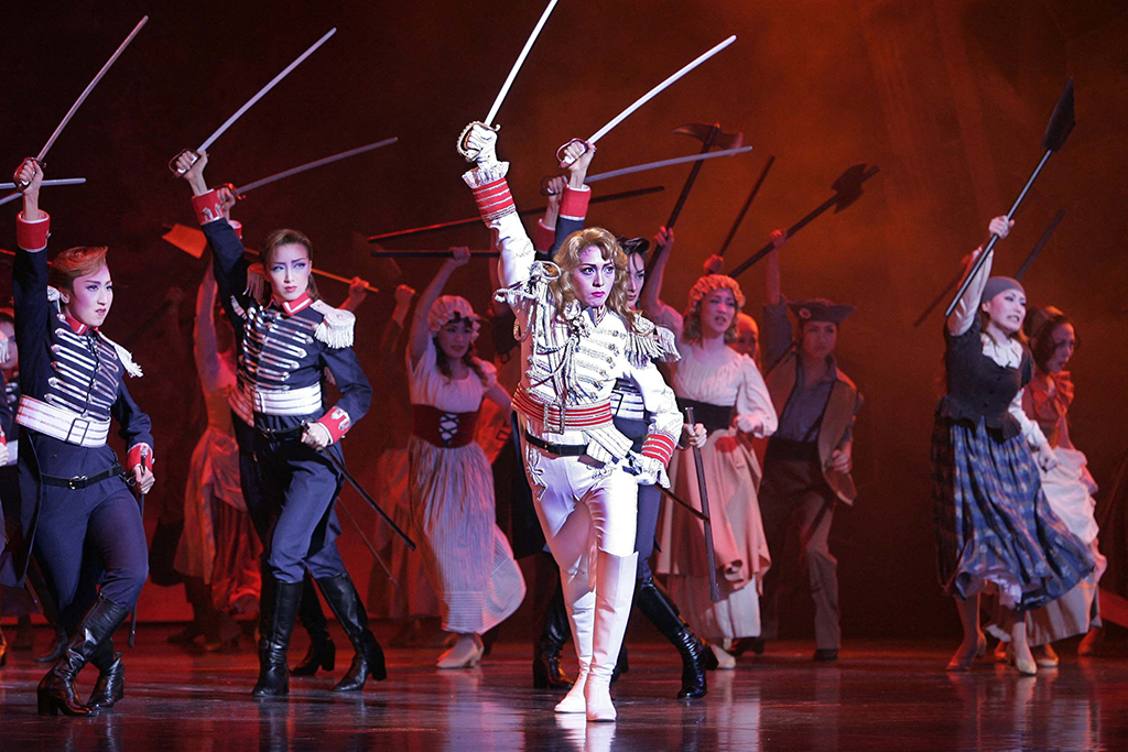 Kei Aran (center) performs as Oscar Francois de Jarjayes, a female captain of the royal guards of French Queen Marie-Antoinette, during the Takarazuka theatre’s ‘The Rose of Versailles’ final rehearsal in Tokyo. Japanese manga ‘The Rose of Versailles’ features elaborate outfits, palace intrigues and passionate romances set against the backdrop of the French Revolution, but it also has its own revolutionary credentials. – AFP photos