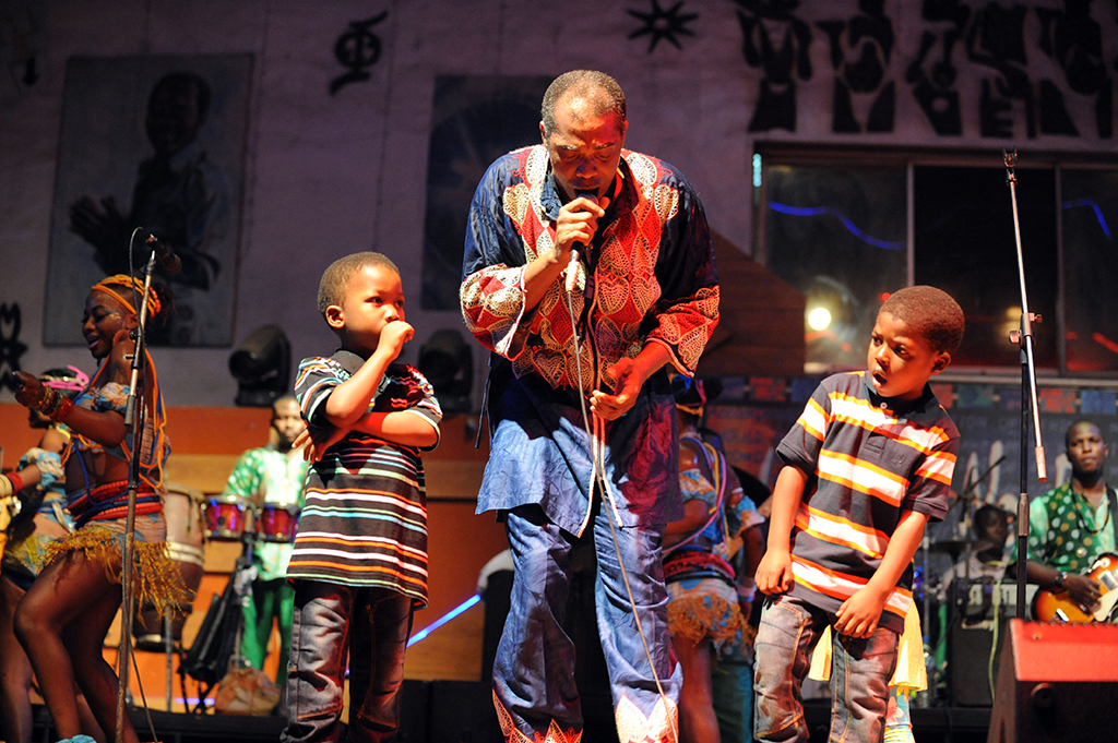 Nigerian musician Femi Kuti, son of legendary afrobeat musician and activist Fela Anikulakpo-Kuti, performs on stage with his children at the New Afrika Shrine in Lagos. – AFP