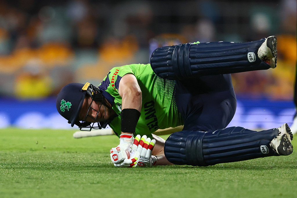 BRISBANE: Ireland’s Barry McCarthy falls over during the ICC men’s Twenty20 World Cup 2022 cricket match between Australia and Ireland on October 31, 2022 in Brisbane. – AFP