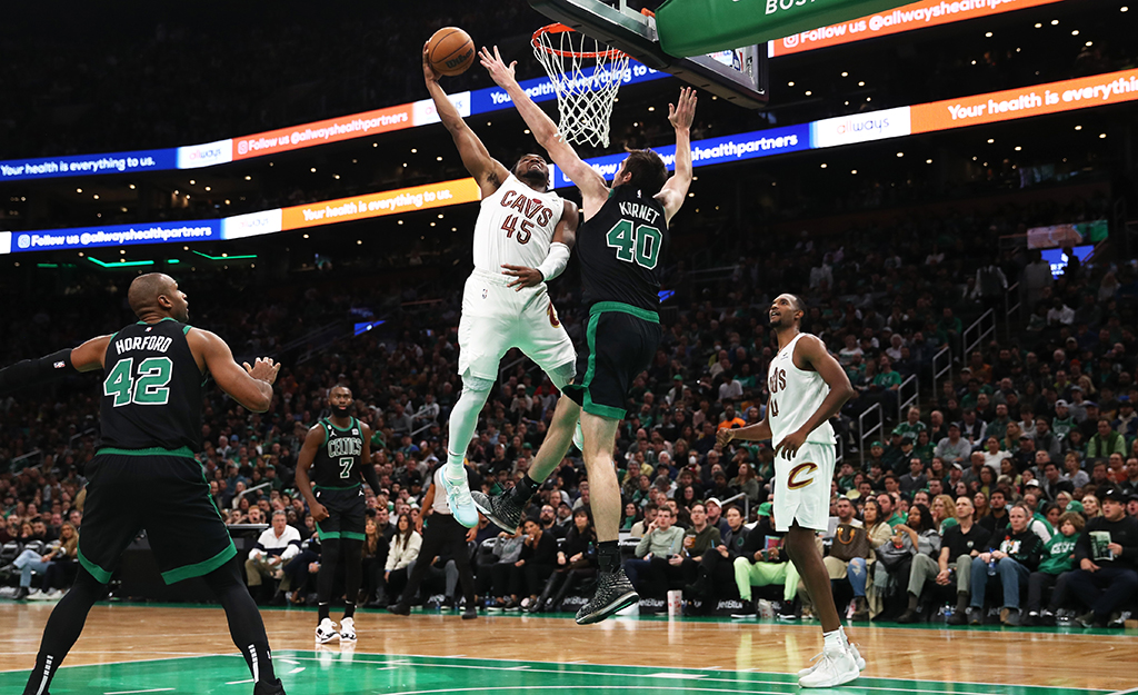 BOSTON: Donovan Mitchell #45 of the Cleveland Cavaliers takes a shot against Luke Kornet #40 of the Boston Celtics during the second half at TD Garden on October 28, 2022.- AFP