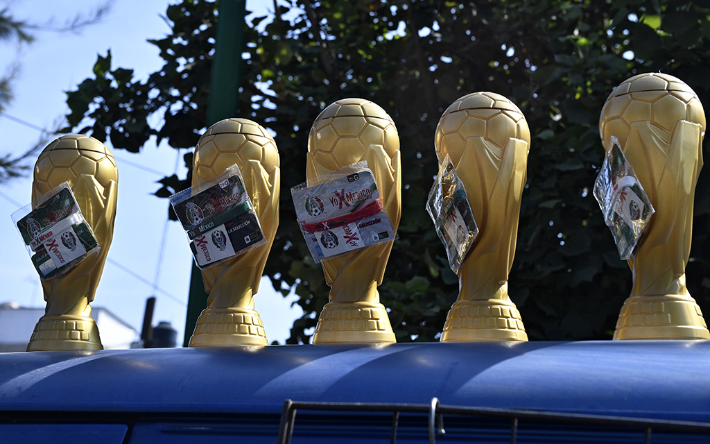 MEXICO CITY: FIFA trophy souvenirs are being sold in a street near the exhibition of the FIFA World Cup Trophy Tour, in Iztapalapa neighborhood in Mexico City. The FIFA World Cup Qatar 2022 will be held from November 20 to December 18, 2022, in Doha. – AFP